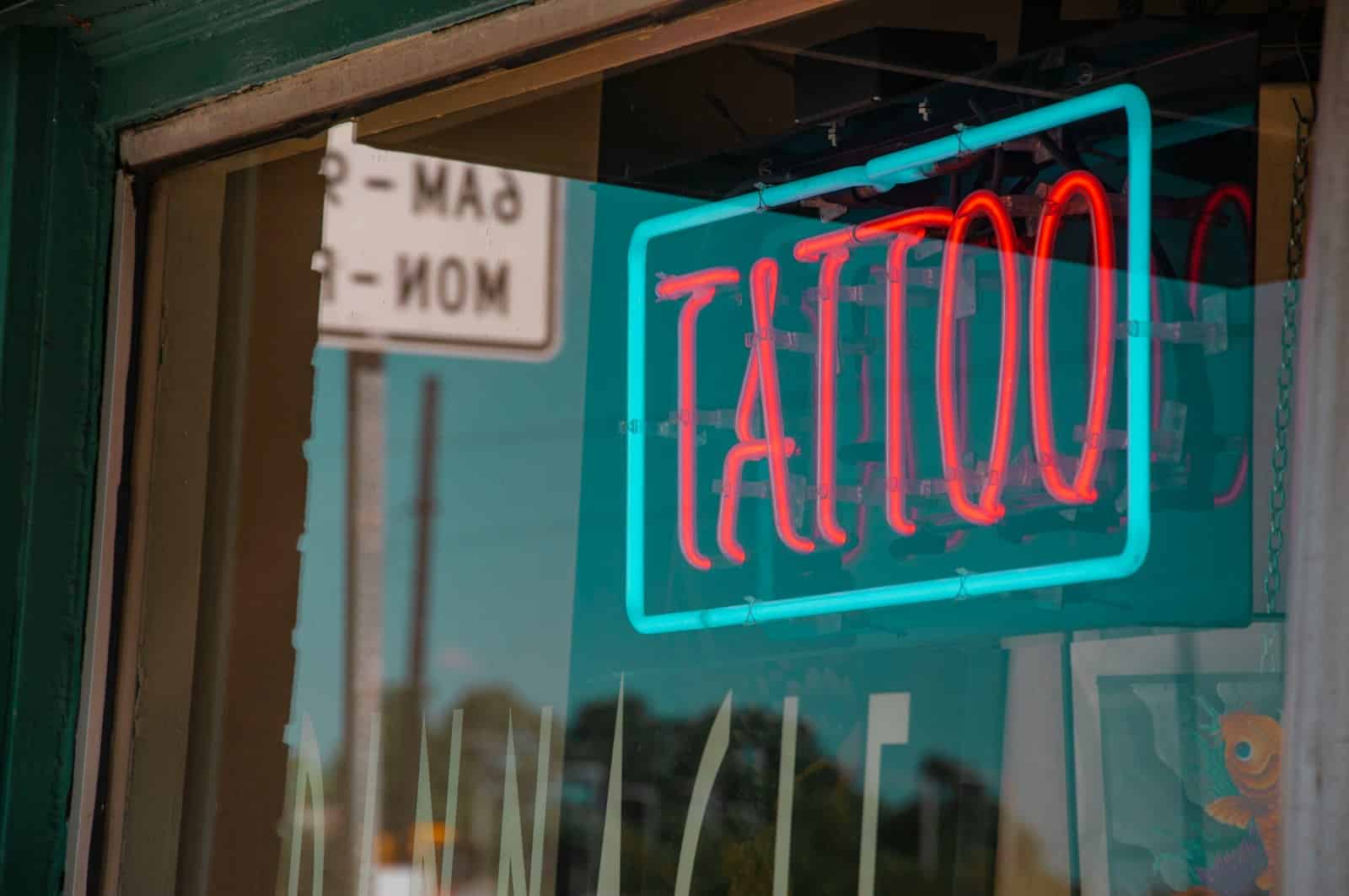 lighted red and green Tattoo neon signage