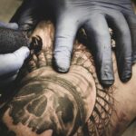 a person with a tattoo on their arm