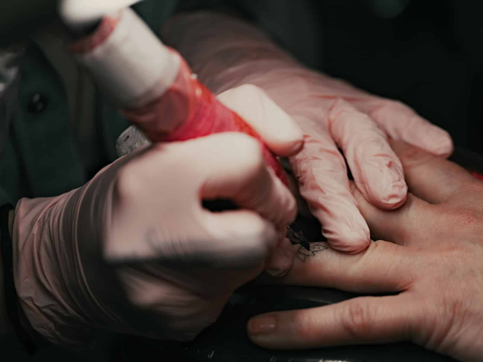 A close up of a person holding another person's hand